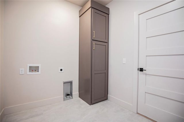 25 Lathrop Dr, Bella Vista, AR 72715 - laundry room with cabinet space, hookup for an electric dryer, hookup for a washing machine, and baseboards