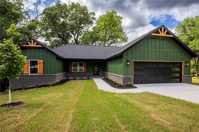 25 Lathrop Dr, Bella Vista, AR 72715 - view of front facade featuring concrete driveway, an attached garage, board and batten siding, a front yard, and brick siding