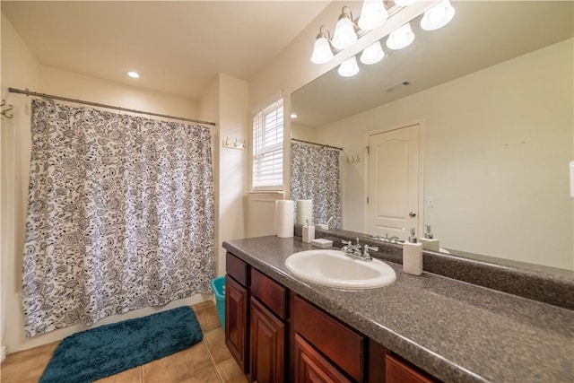 full bath featuring tile patterned floors and vanity