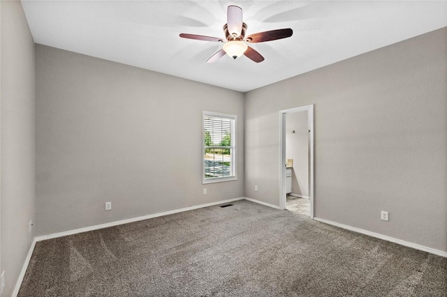 6 Rivercliff Rd, Rogers, AR 72756 - carpeted spare room featuring a ceiling fan and baseboards