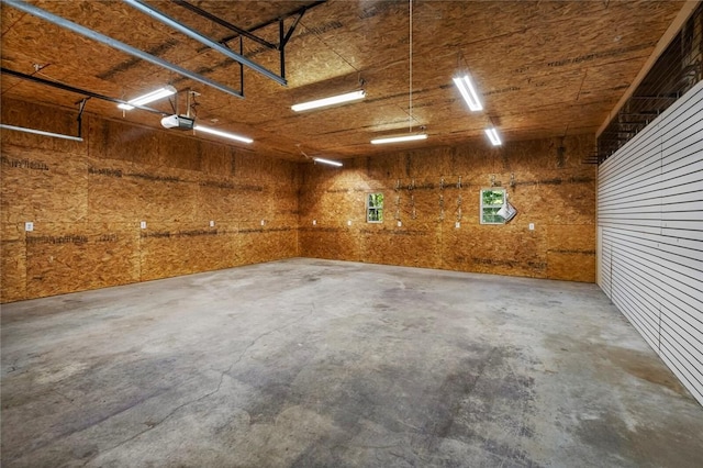 6 Rivercliff Rd, Rogers, AR 72756 - garage featuring a garage door opener