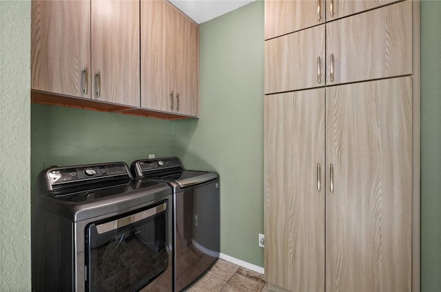 6 Rivercliff Rd, Rogers, AR 72756 - laundry area featuring cabinet space, washing machine and clothes dryer, and light tile patterned floors