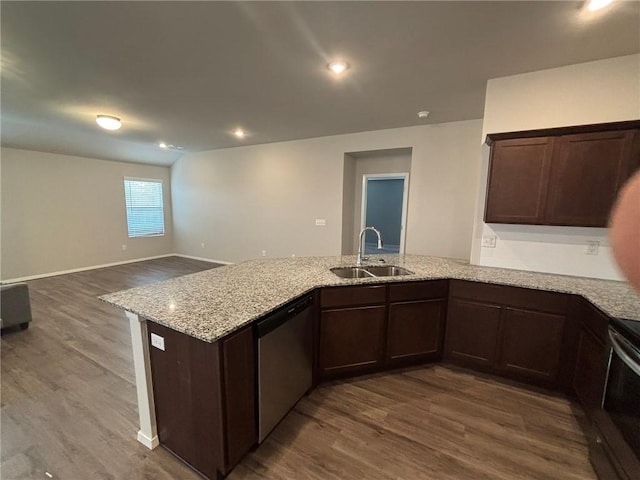811 Belhaven Rd, Centerton, AR 72719 - kitchen featuring stainless steel appliances, a sink, a peninsula, dark wood-style flooring, and dark brown cabinets