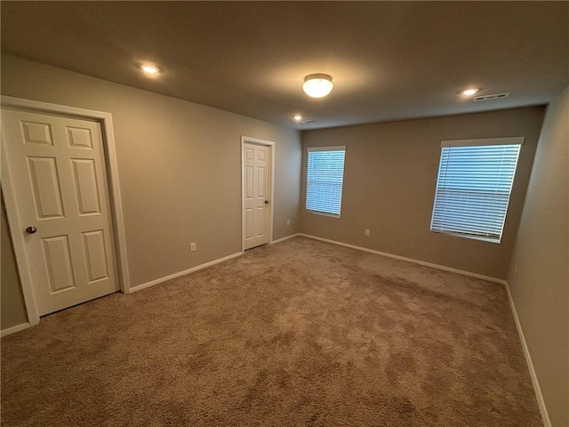 811 Belhaven Rd, Centerton, AR 72719 - carpeted spare room featuring baseboards and recessed lighting
