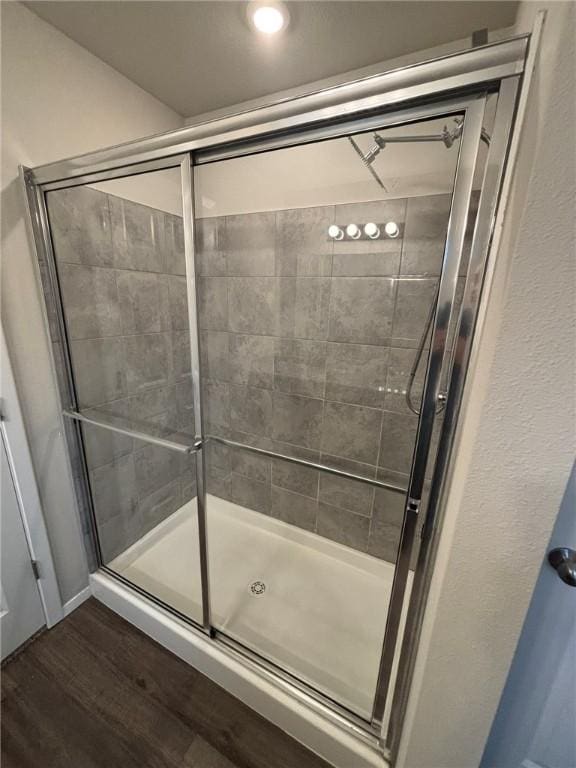 811 Belhaven Rd, Centerton, AR 72719 - full bath with a stall shower and wood finished floors