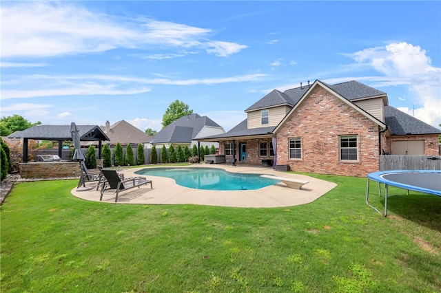 6503 S 35th St, Rogers, AR 72758 - view of swimming pool with a gazebo, a patio, a trampoline, and a diving board