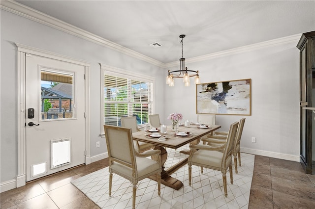 6503 S 35th St, Rogers, AR 72758 - dining area featuring crown molding, a chandelier, and baseboards