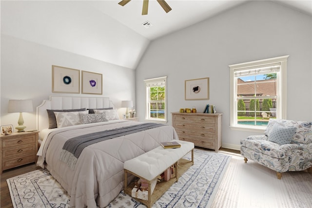 6503 S 35th St, Rogers, AR 72758 - bedroom featuring vaulted ceiling, wood finished floors, and ceiling fan