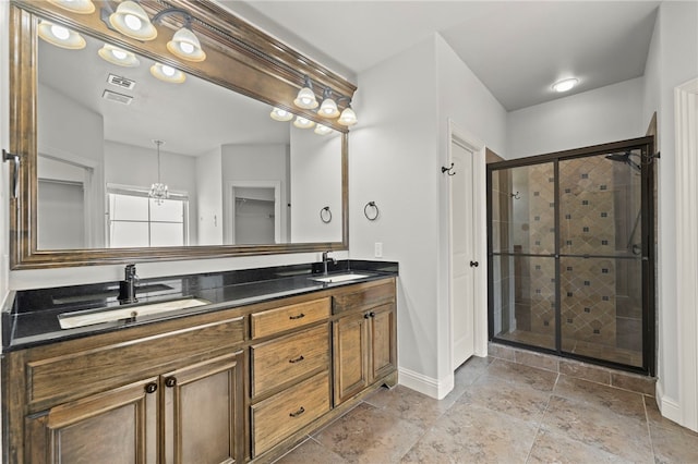 6503 S 35th St, Rogers, AR 72758 - full bathroom with a stall shower, baseboards, and double vanity
