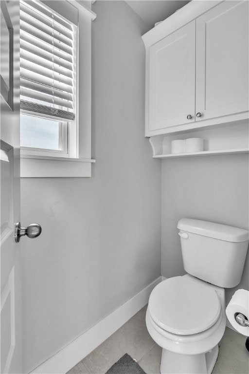 12 E Loveland Loop, Farmington, AR 72730 - bathroom with baseboards, toilet, and tile patterned flooring