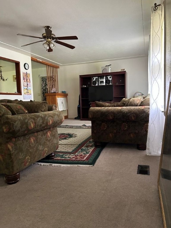 1002 N Pleasant St, Springdale, AR 72764 - carpeted living area featuring ceiling fan