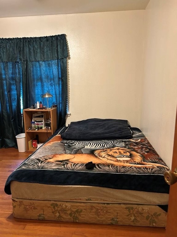 1002 N Pleasant St, Springdale, AR 72764 - bedroom with wood finished floors