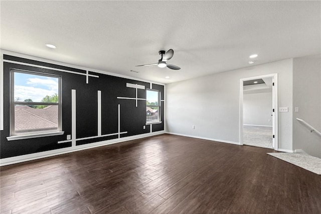 1302 Walker Dr, Rogers, AR 72756 - empty room featuring ceiling fan, dark wood finished floors, recessed lighting, and baseboards