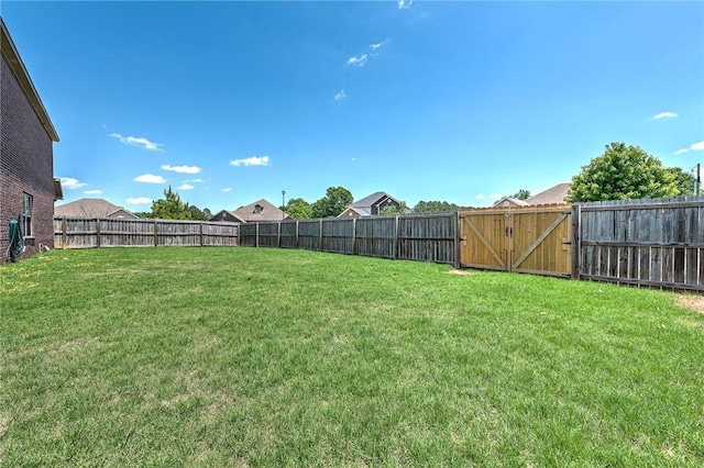 1302 Walker Dr, Rogers, AR 72756 - view of yard with a gate