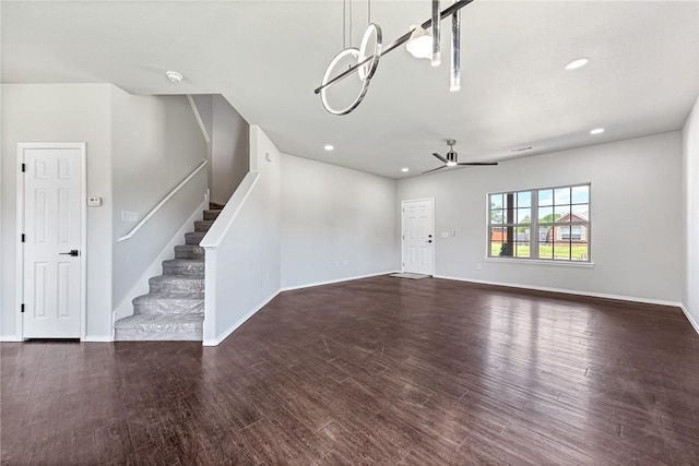 1302 Walker Dr, Rogers, AR 72756 - unfurnished living room with a ceiling fan, baseboards, wood finished floors, and recessed lighting