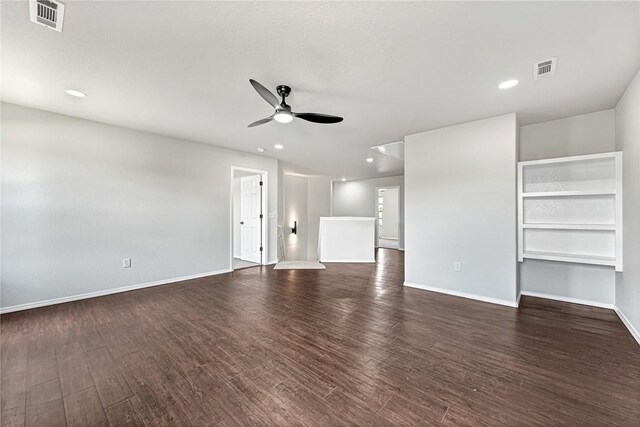 1302 Walker Dr, Rogers, AR 72756 - unfurnished living room with ceiling fan, baseboards, dark wood-type flooring, and recessed lighting