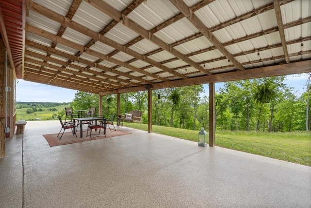 713 Madison Unit 8744, Huntsville, AR 72740 - view of patio / terrace featuring outdoor dining space