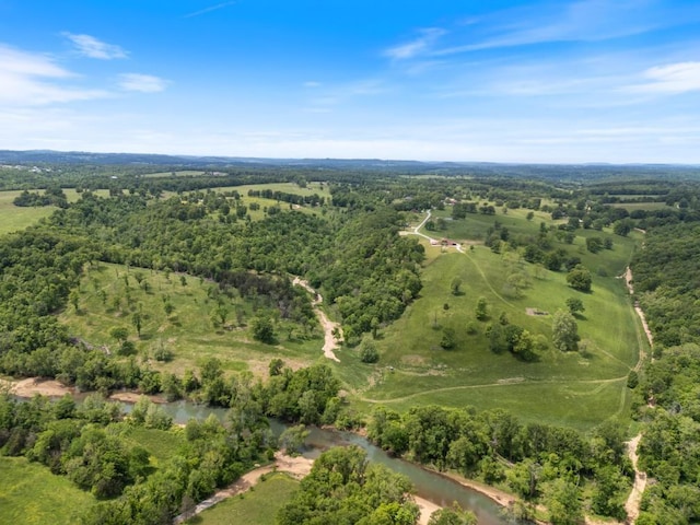 713 Madison Unit 8744, Huntsville, AR 72740 - aerial view of property and surrounding area with a heavily wooded area