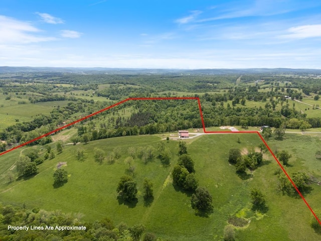 713 Madison Unit 8744, Huntsville, AR 72740 - aerial view of sparsely populated area with property boundaries highlighted and a heavily wooded area