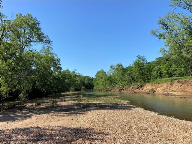 713 Madison Unit 8744, Huntsville, AR 72740 - view of yard with a water view and a view of trees