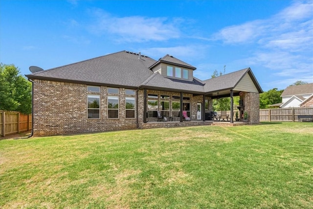 back of house with a patio, brick siding, and a shingled roof