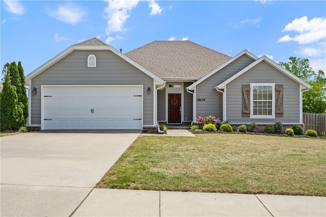 view of front of home featuring an attached garage and driveway