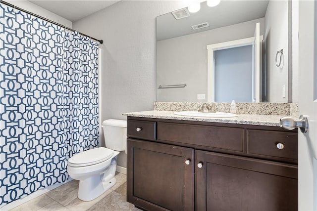 full bathroom with toilet, vanity, and a shower with shower curtain