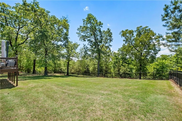 view of yard featuring a wooden deck