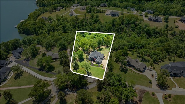 view of property location featuring a nearby body of water and property boundaries highlighted