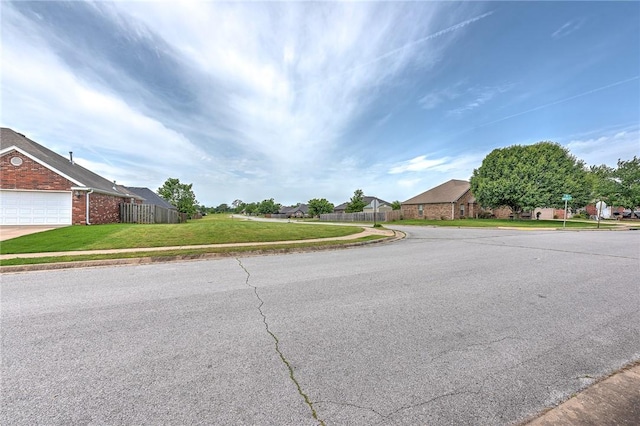 6201 S 36th St, Rogers, AR 72758 - view of asphalt road with sidewalks, curbs, and a residential view