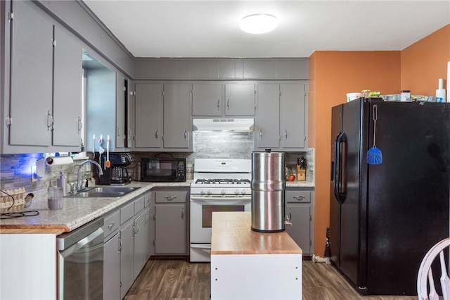 405 Stapleton Pl, Lincoln, AR 72744 - kitchen with black appliances, a sink, under cabinet range hood, and gray cabinetry