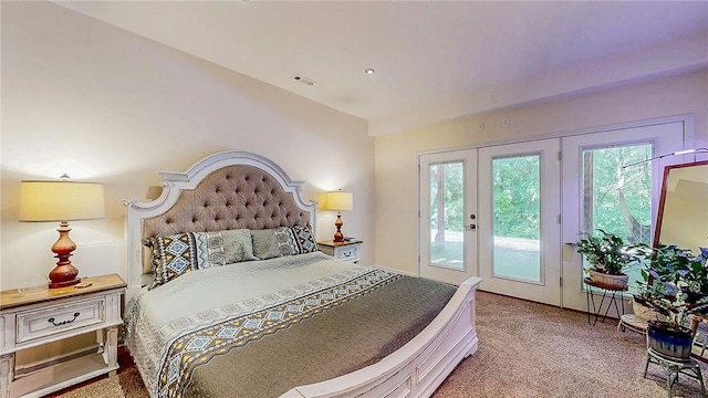 carpeted bedroom with access to outside