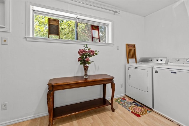 206 Suttle Dr, Springdale, AR 72764 - laundry room featuring washing machine and clothes dryer and light wood-type flooring