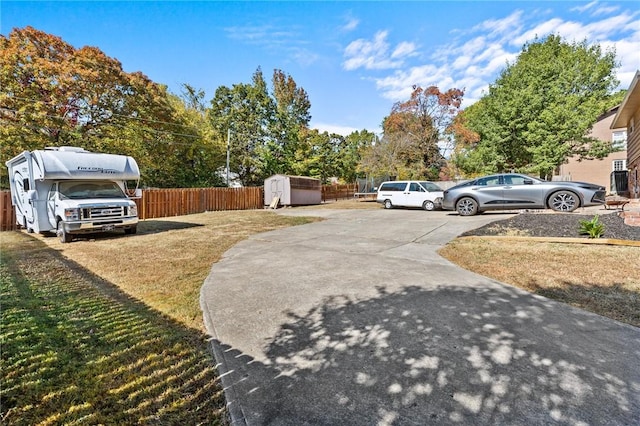 206 Suttle Dr, Springdale, AR 72764 - view of yard featuring a storage shed