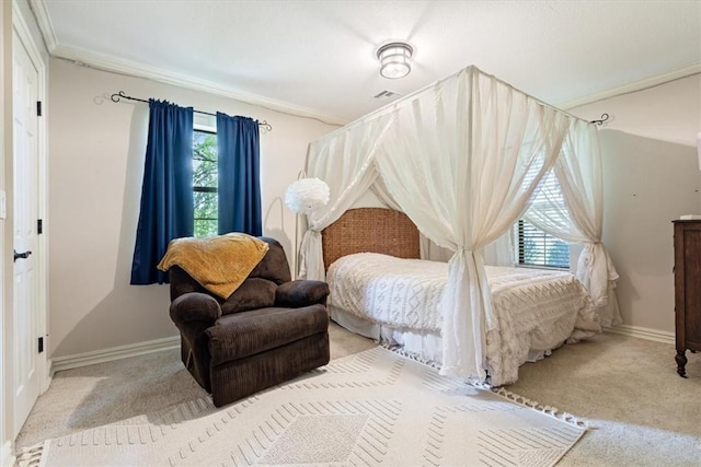 bedroom featuring carpet, multiple windows, ornamental molding, and baseboards