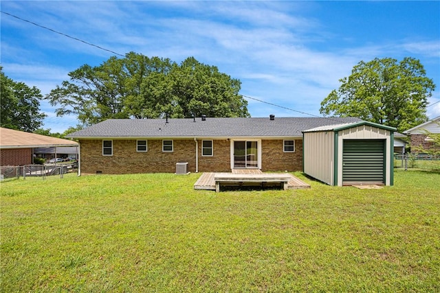 208 Date St, Russellville, AR 72802 - rear view of house featuring central air condition unit, an outdoor structure, a deck, a shed, and brick siding