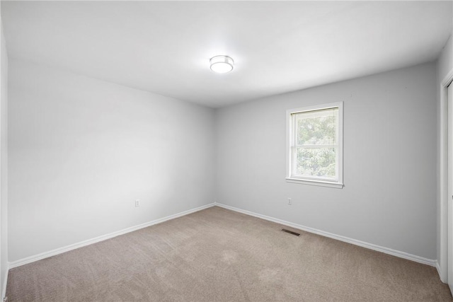 208 Date St, Russellville, AR 72802 - carpeted empty room featuring baseboards