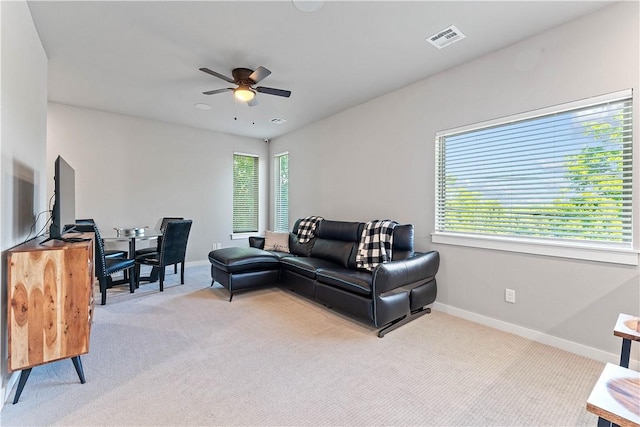 293 W Ash St Unit 1, Fayetteville, AR 72703 - living room with light colored carpet, ceiling fan, and baseboards
