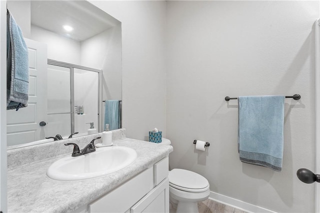 293 W Ash St Unit 1, Fayetteville, AR 72703 - full bathroom featuring vanity, a stall shower, toilet, and baseboards