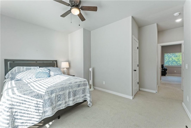 293 W Ash St Unit 1, Fayetteville, AR 72703 - bedroom with baseboards, carpet, and ceiling fan