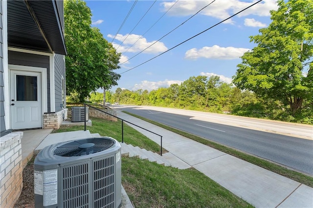 293 W Ash St Unit 1, Fayetteville, AR 72703 - view of asphalt road with sidewalks