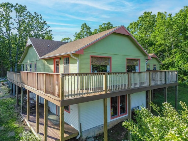10190 Summit Dr, Rogers, AR 72758 - rear view of house featuring a deck and roof with shingles