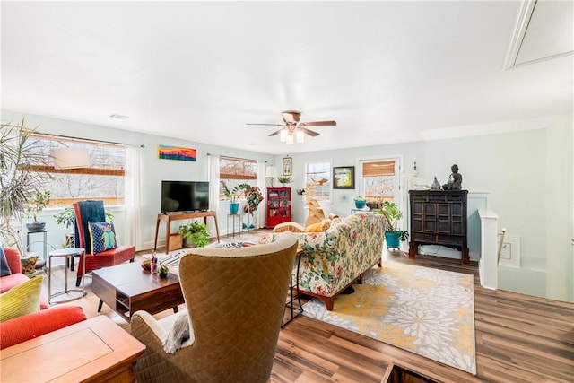 10190 Summit Dr, Rogers, AR 72758 - living area featuring wood finished floors, attic access, and a ceiling fan