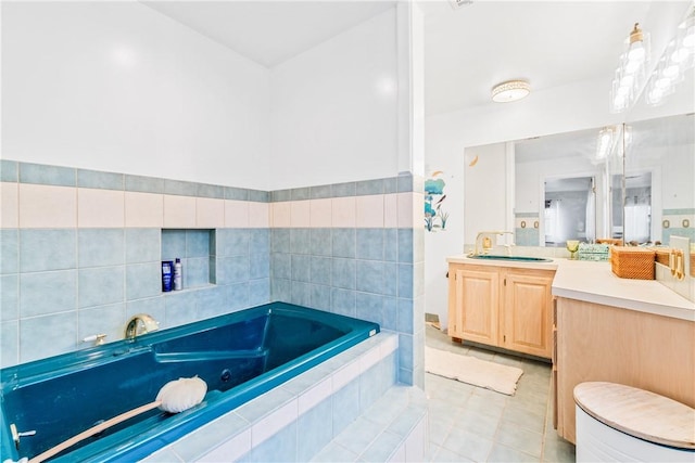 10190 Summit Dr, Rogers, AR 72758 - full bathroom with vanity, a bath, tile patterned floors, and tile walls