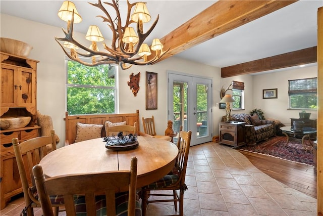 21432 Lakeview Dr, Garfield, AR 72732 - dining area featuring beamed ceiling, a chandelier, and light tile patterned floors