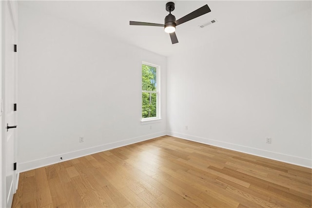 17 Winters Dr, Bella Vista, AR 72714 - unfurnished room featuring baseboards, light wood-type flooring, and a ceiling fan