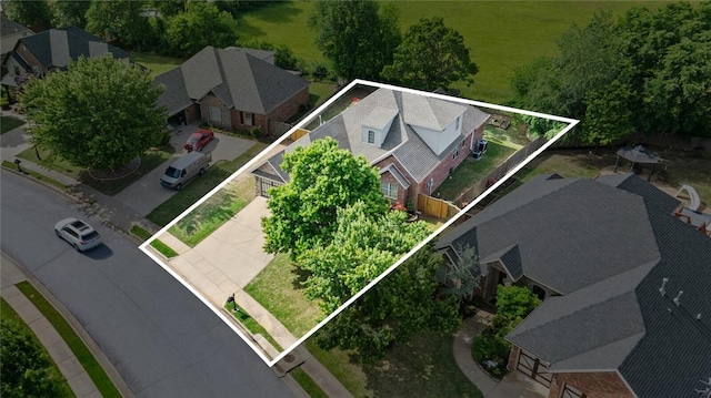aerial view of residential area with property parcel outlined