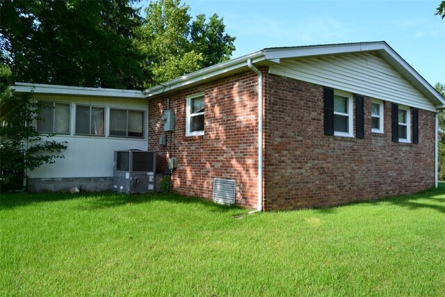 420 Natchez Trace Dr, Harrison, AR 72601 - view of home's exterior with a yard, brick siding, and crawl space