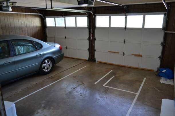 420 Natchez Trace Dr, Harrison, AR 72601 - garage featuring a garage door opener