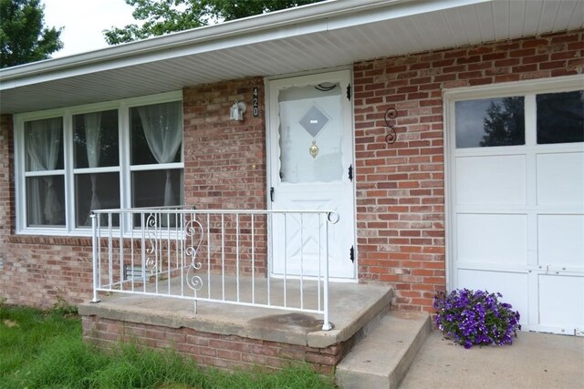 420 Natchez Trace Dr, Harrison, AR 72601 - property entrance featuring brick siding and a porch